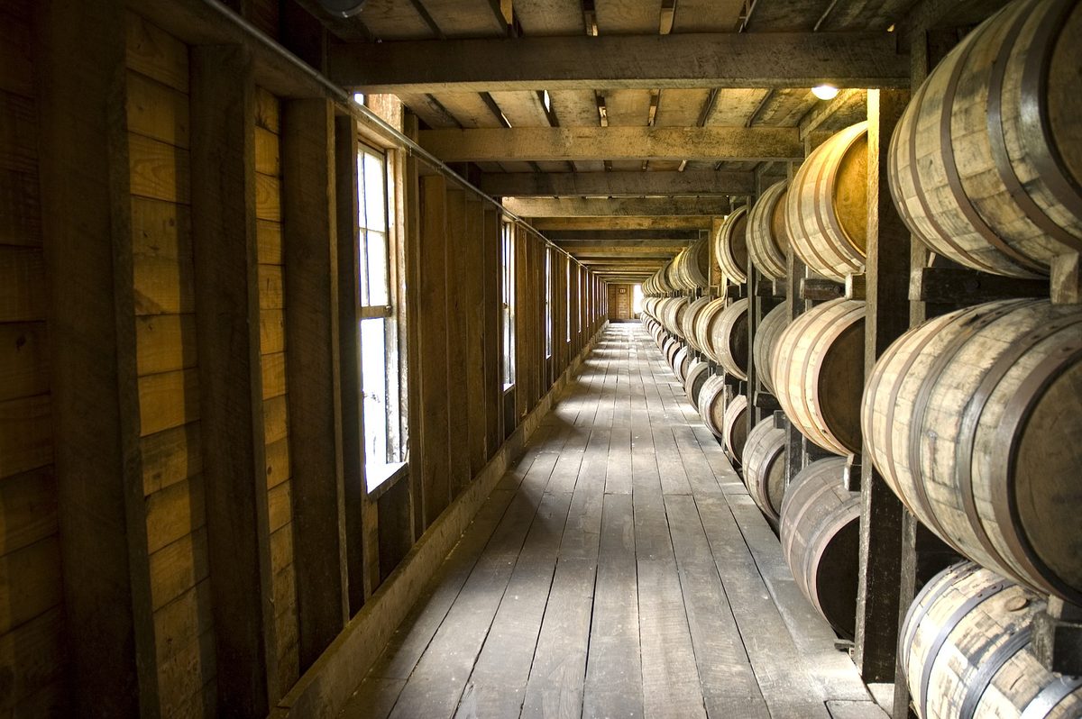 Kentucky bourbon distillery rickhouse with aging barrels